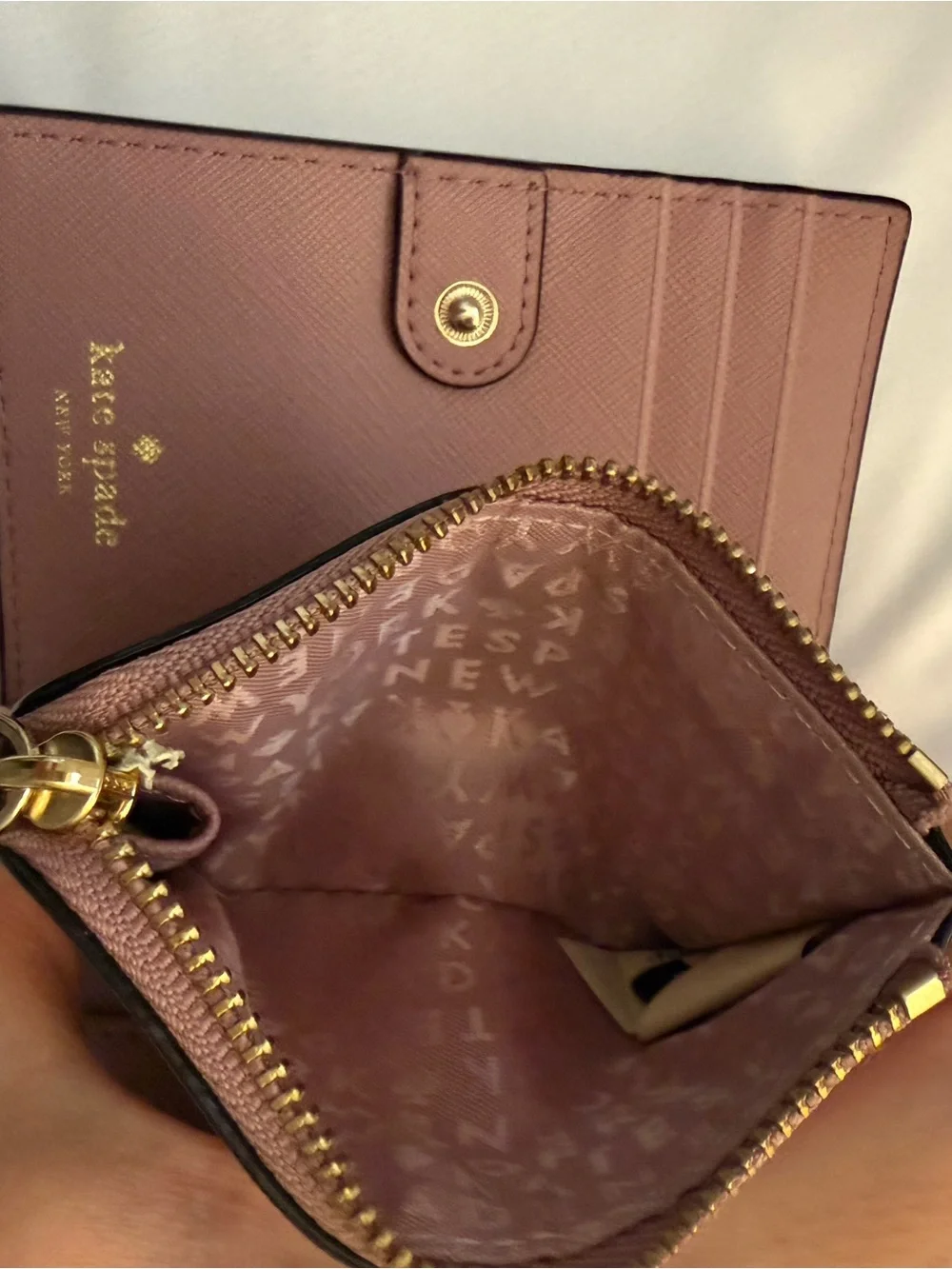 kate spade mauve pink leather zip wallet with gold plaque